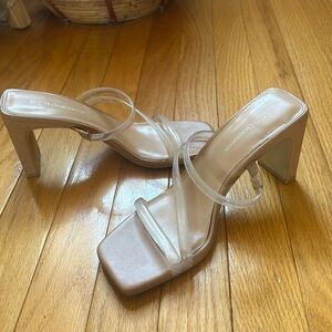 BCBGeneration clear strappy nude heels; heel height approx 3 inch